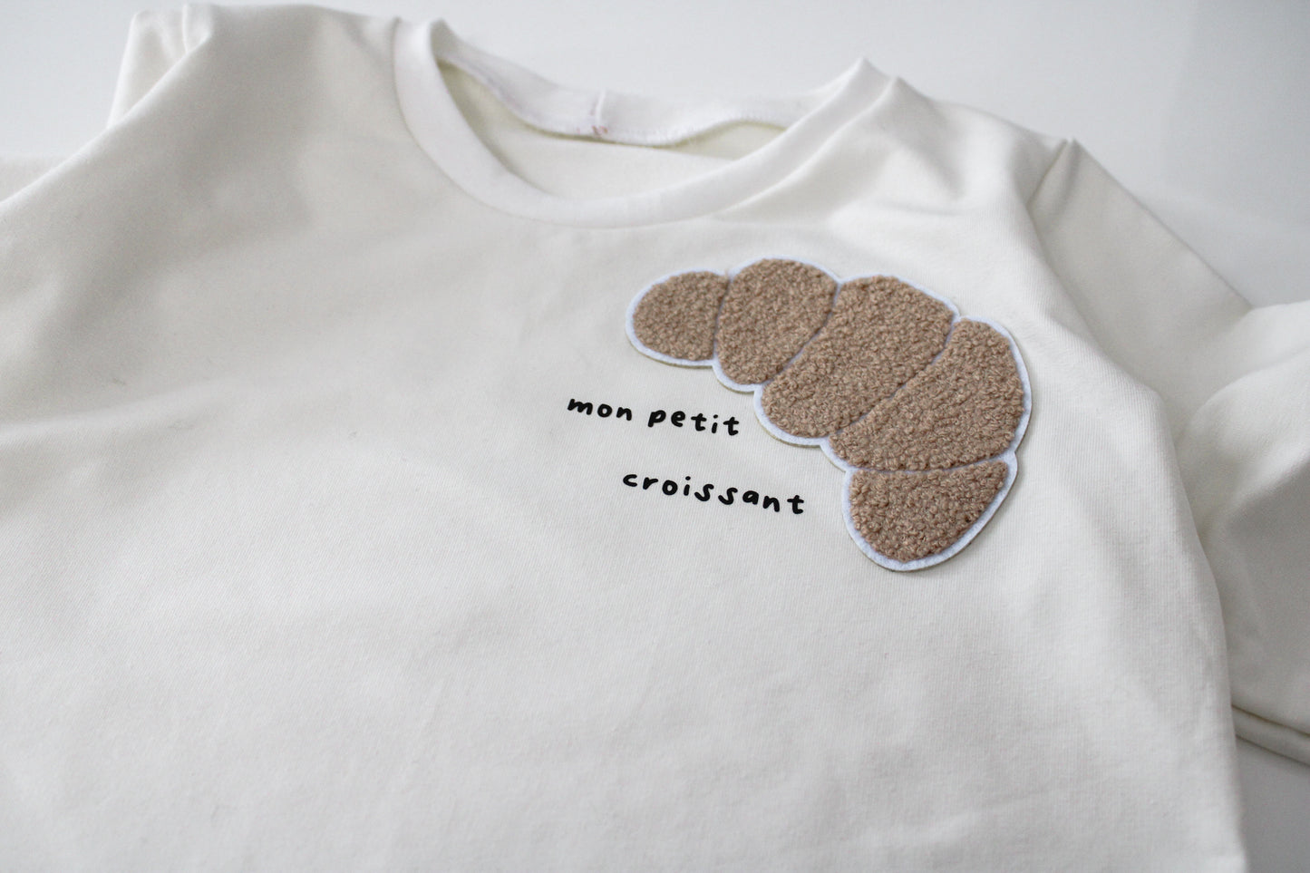 Petit Croissant Langarmshirt Sweater Kinder