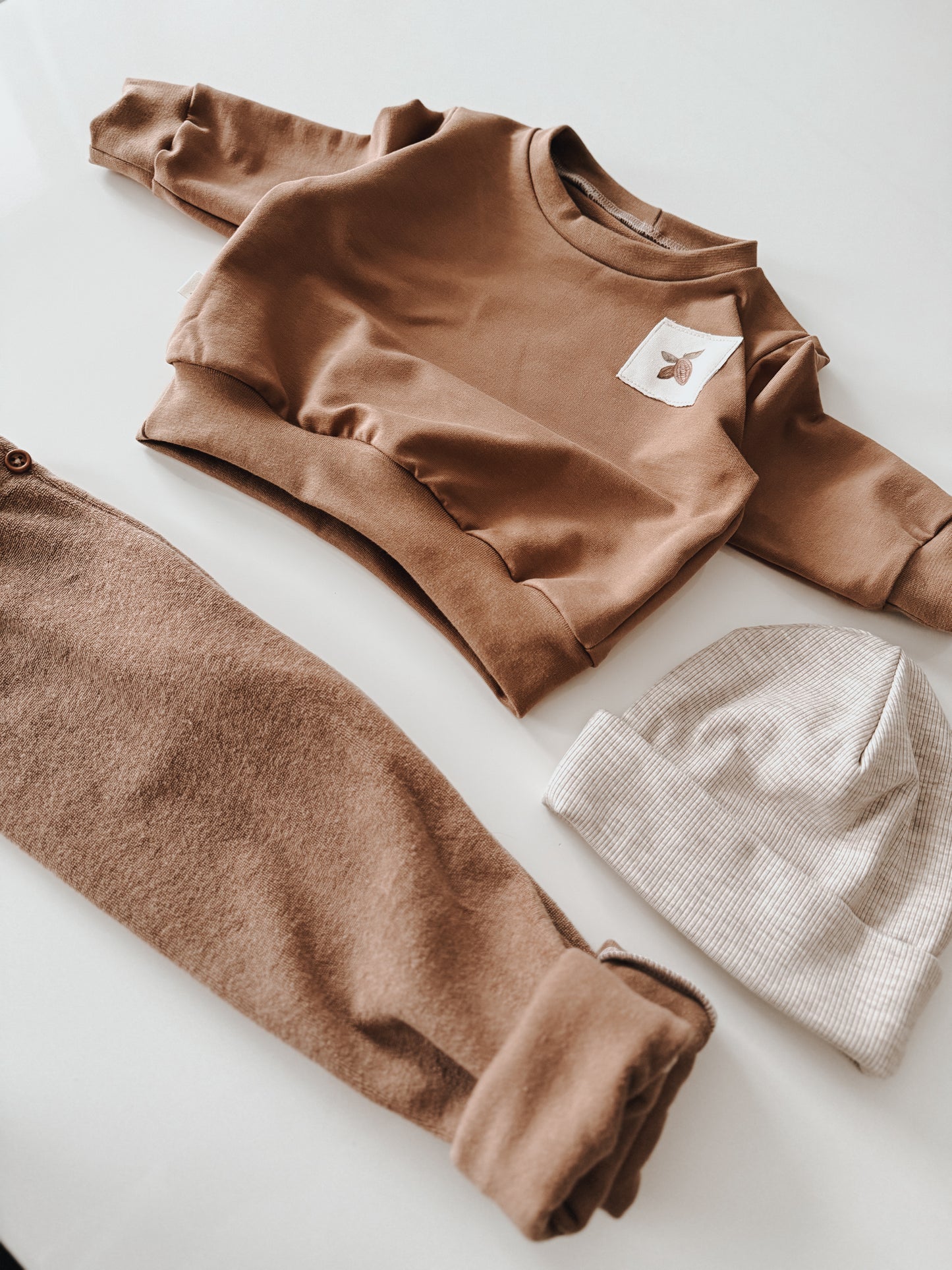 Hangemachtes Pullover mit Cacao Patch aus Baumwolle French Terry